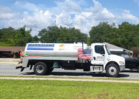 Martin Septic vacuum tanker truck on the road heading to a call