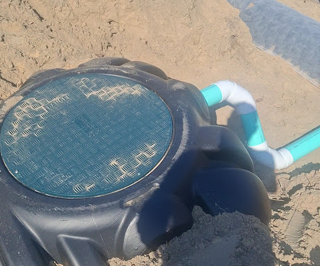New septic tank set with riser and inlet pipe connected