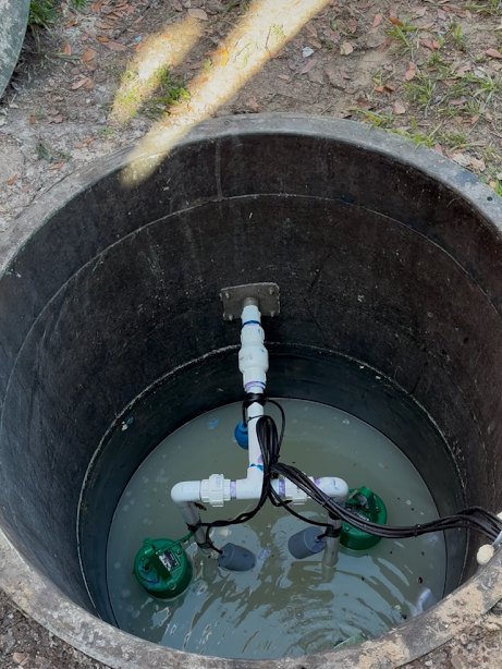 Pump basin with pumps and float switches